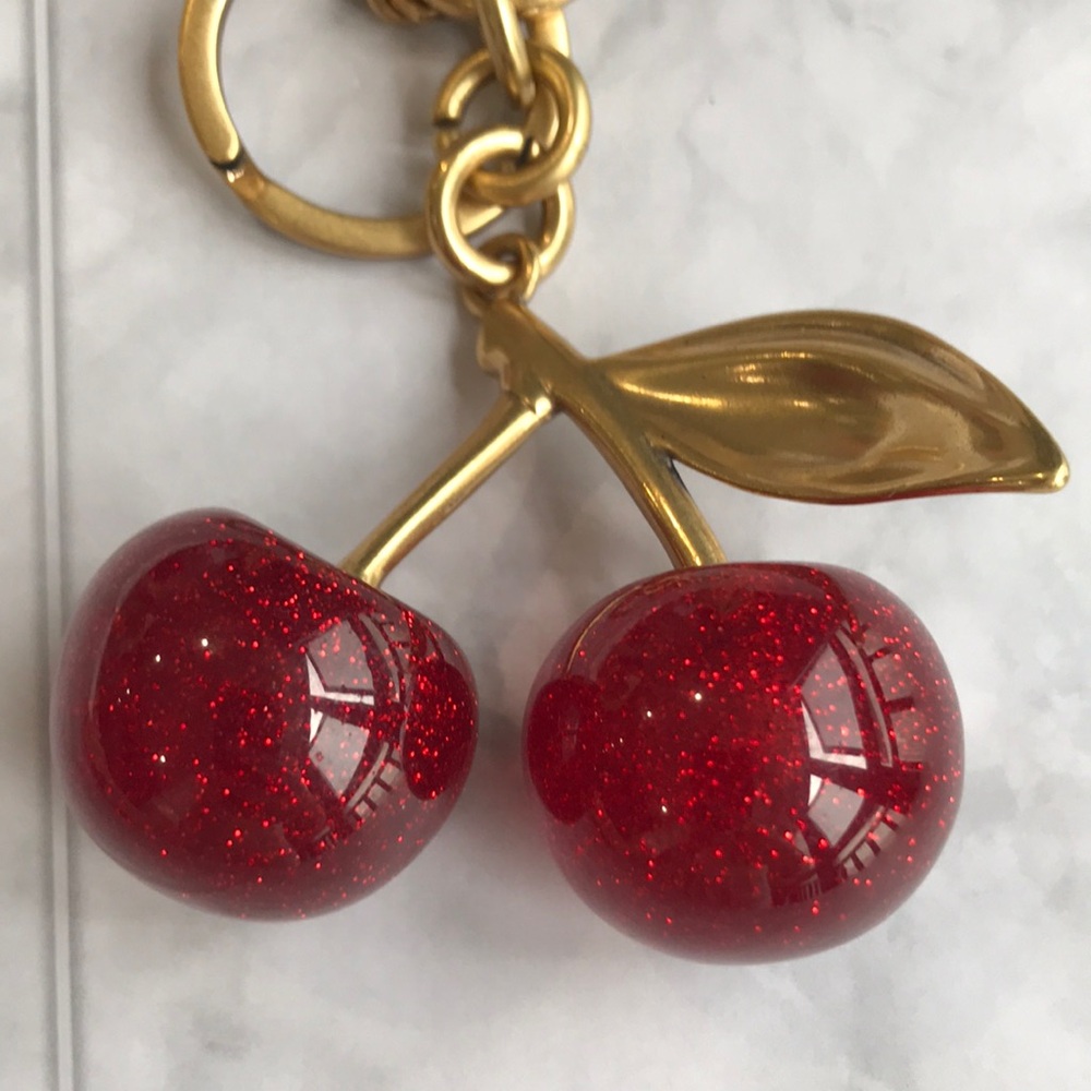 Coach Gold-Tone Hardware with Red Glitter Cherry Key Charm - Picture 2 of 3